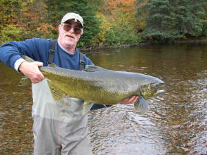Jeff shows off a big Garden River King salmon he caught on the fly.